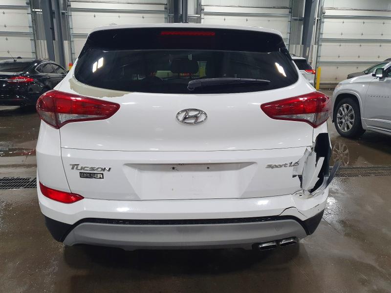 Photo 6 from auction – 2017 HYUNDAI TUCSON LIM with VIN KM8J33A29HU390643