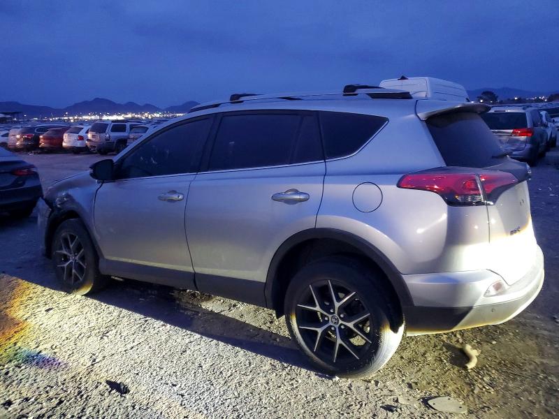 Photo 2 from auction – 2018 TOYOTA RAV4 SE with VIN JTMNFREV7JD120479