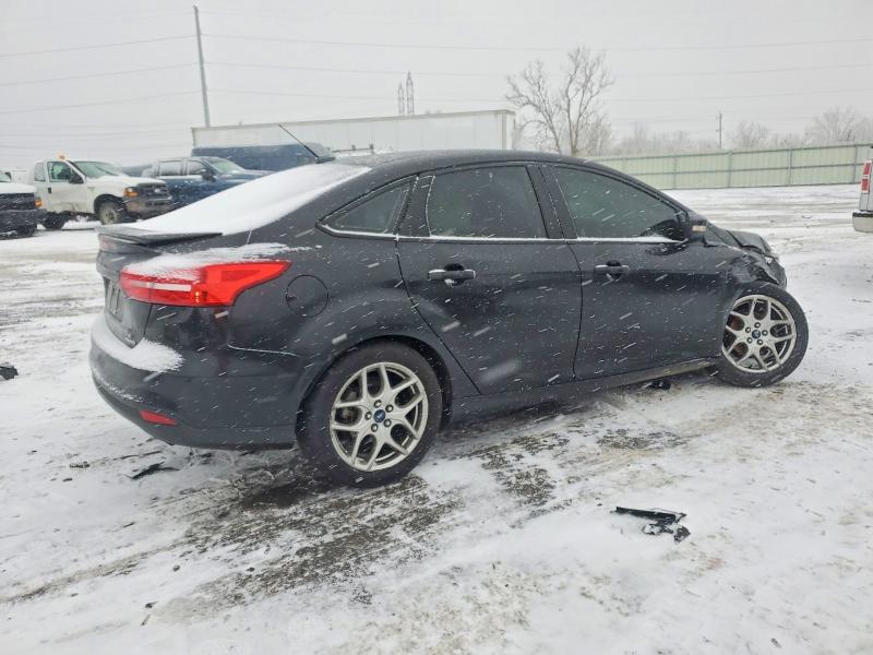 Photo 3 from auction – 2015 FORD FOCUS SE with VIN 1FADP3F22FL376087