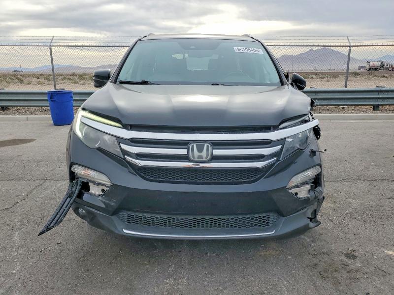 Photo 5 from auction – 2016 HONDA PILOT with VIN 5FNYF5H96GB044288