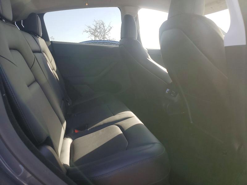 Photo 11 from auction – 2023 TESLA MODEL Y with VIN 7SAYGDEE1PA150883