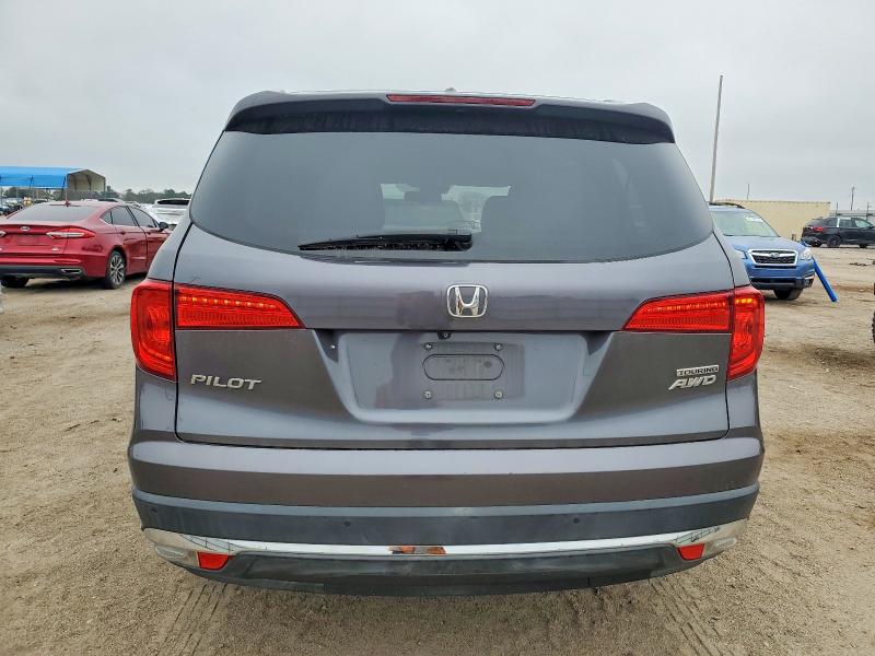 Photo 6 from auction – 2016 HONDA PILOT TOUR with VIN 5FNYF6H95GB081192