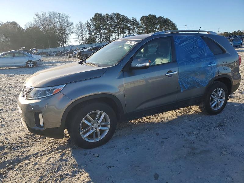 KIA SORENTO LX 2015 with VIN 5XYKT3A69FG661968 - Photo from auction