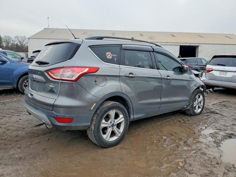 Photo 3 from auction – 2014 FORD ESCAPE SE with VIN 1FMCU9G95EUE28877