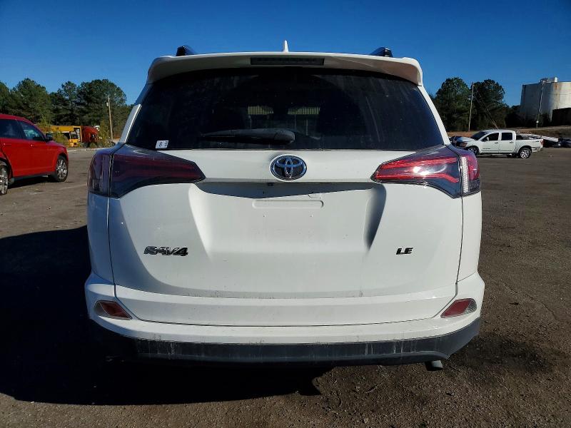 Photo 6 from auction – 2018 TOYOTA RAV4 LE with VIN JTMZFREV0JJ201570