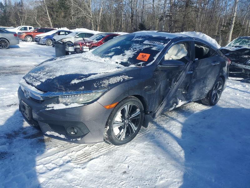 HONDA CIVIC 2017 with VIN 2HGFC1F99HH105982 - Photo from auction