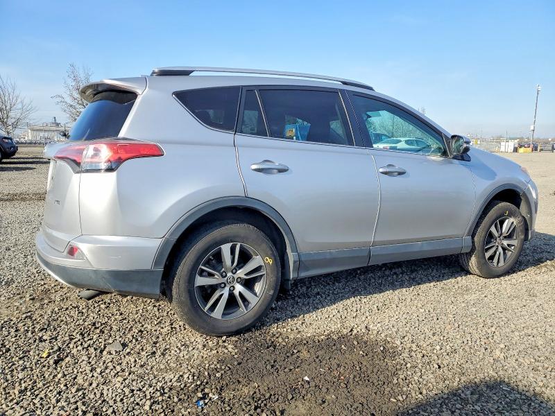 Photo 3 from auction – 2016 TOYOTA RAV4 XLE with VIN 2T3WFREVXGW285054