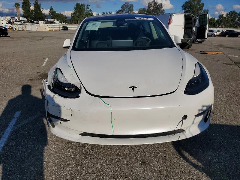 Photo 11 from auction – 2021 TESLA MODEL 3 with VIN 5YJ3E1EA8MF921394