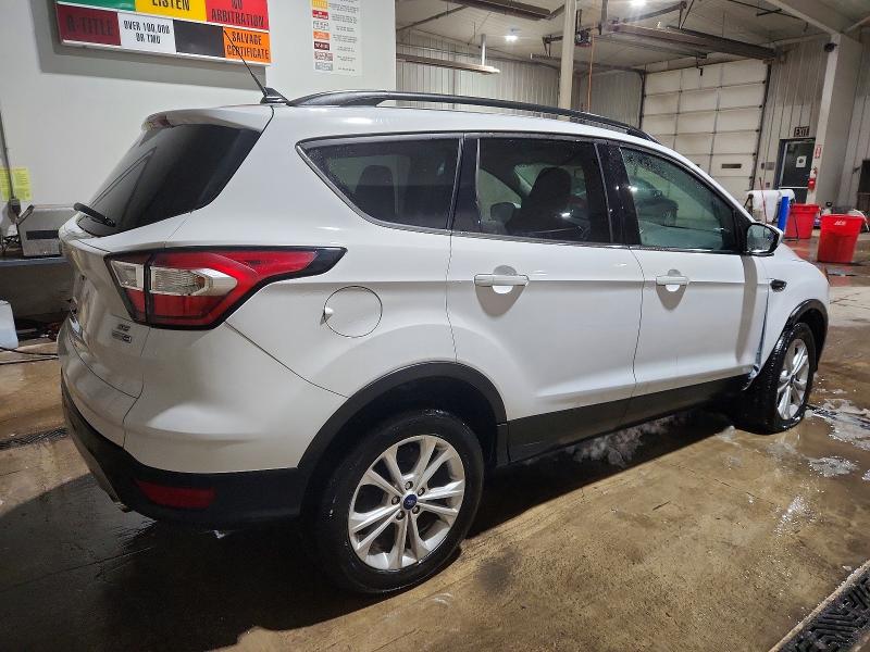 Photo 3 from auction – 2018 FORD ESCAPE SE with VIN 1FMCU9GD7JUD33588
