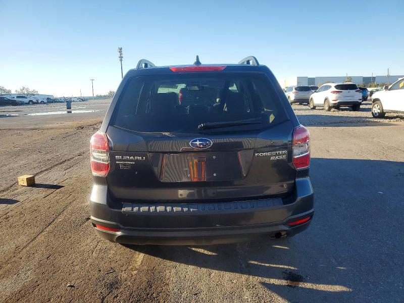 Photo 6 from auction – 2016 SUBARU FORESTER with VIN JF2SJADC0GH543412