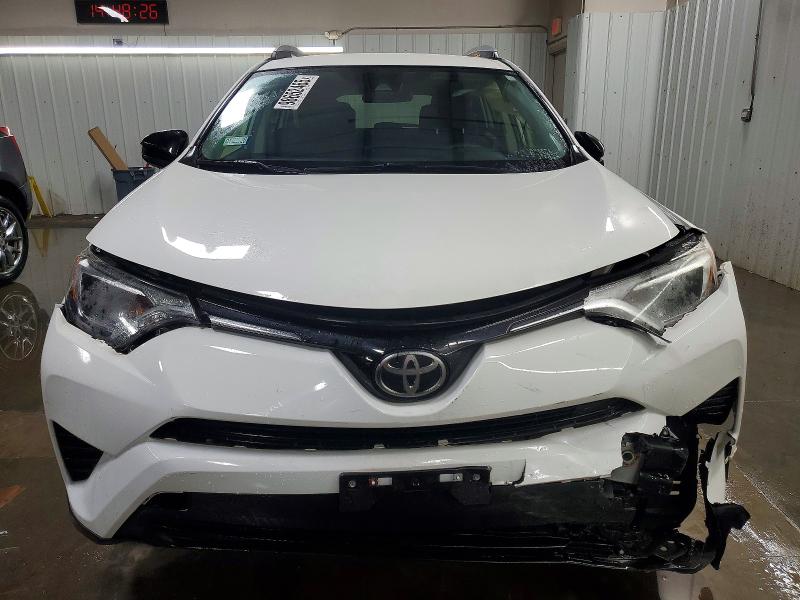 Photo 5 from auction – 2018 TOYOTA RAV4 LE with VIN JTMBFREV4JJ742445