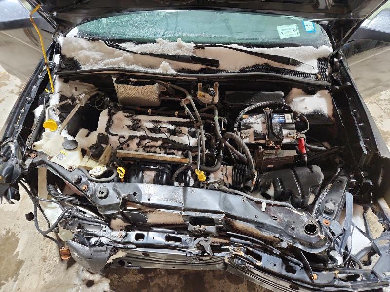 Photo 11 from auction – 2008 FORD FOCUS with VIN 1FAHP35N48W256063
