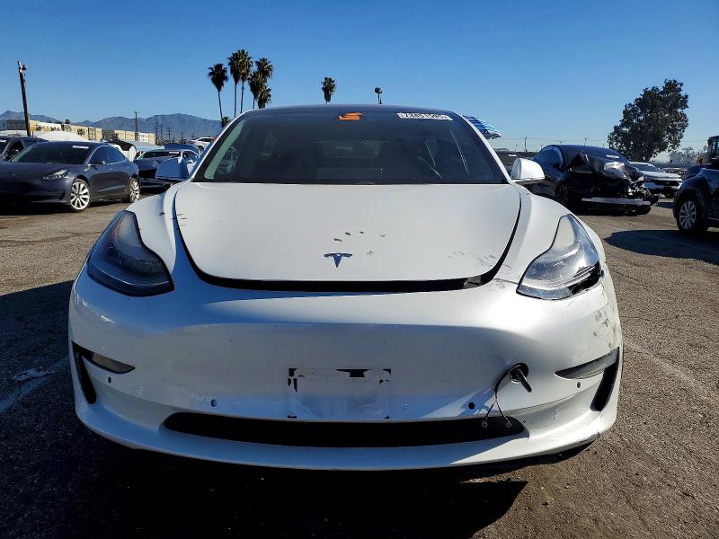 Photo 5 from auction – 2018 TESLA MODEL 3 with VIN 5YJ3E1EAXJF025044