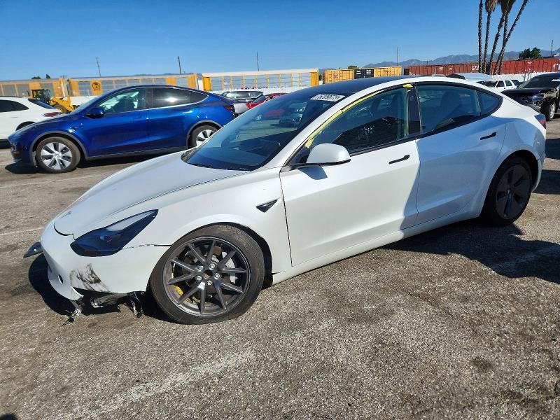 TESLA MODEL 3 2023 with VIN 5YJ3E1EA3PF560564 - Photo from auction
