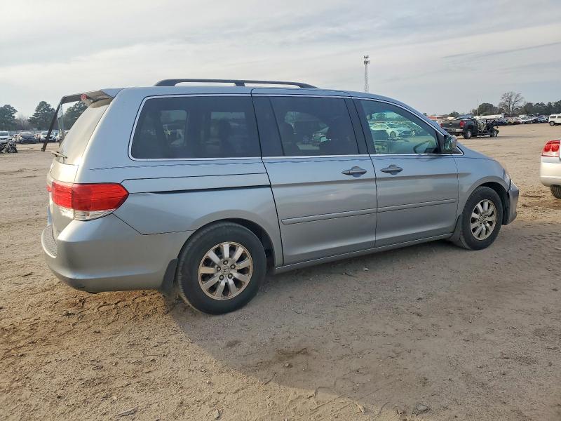 Photo 3 from auction – 2010 HONDA ODYSSEY with VIN 5FNRL3H70AB035528