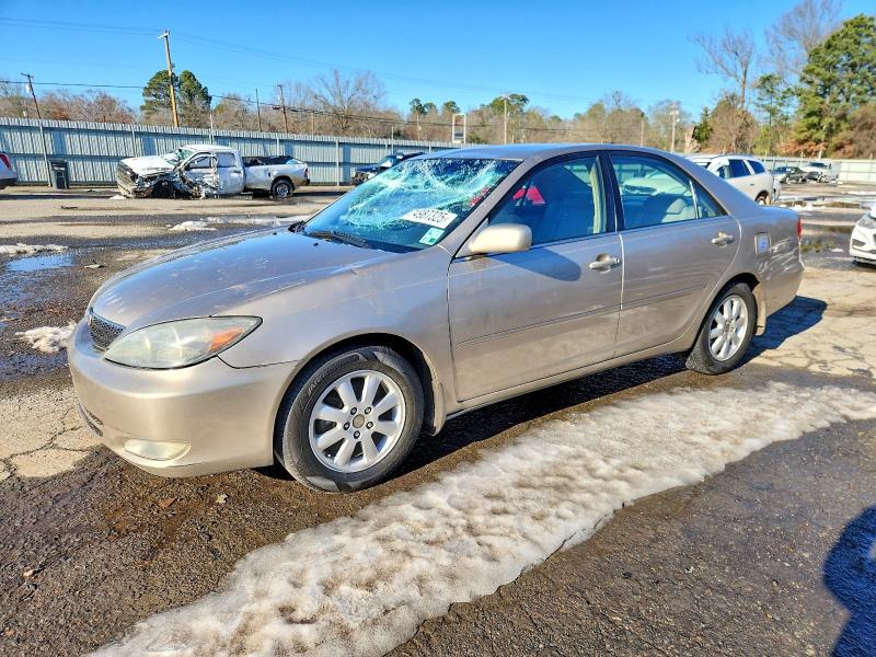 TOYOTA CAMRY LE 2004 with VIN JTDBE32K340292579 - Photo from auction