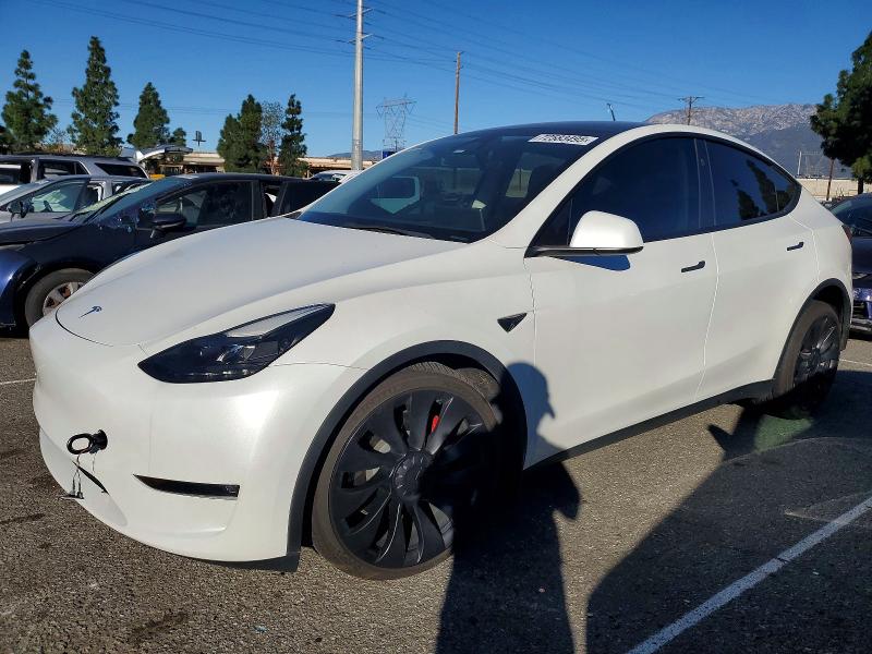 TESLA MODEL Y 2023 с VIN 7SAYGDEF6PF800741 - Фото с аукциона