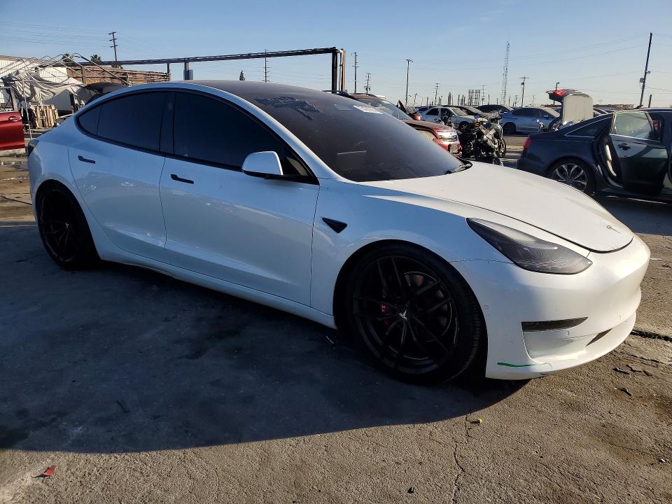 Photo 4 from auction – 2022 TESLA MODEL 3 with VIN 5YJ3E1EA4NF301966