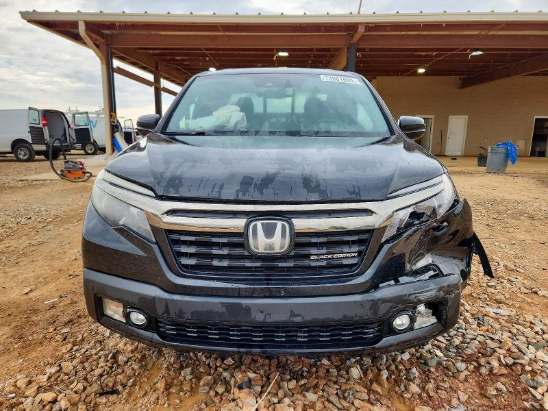 Photo 5 from auction – 2019 HONDA RIDGELINE with VIN 5FPYK3F84KB007802
