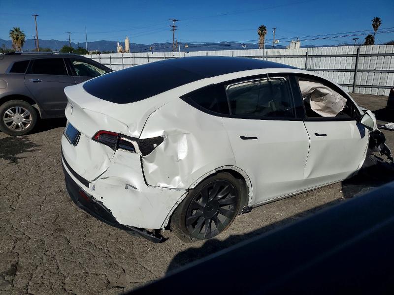 Photo 3 from auction – 2021 TESLA MODEL Y with VIN 5YJYGDEE9MF090721