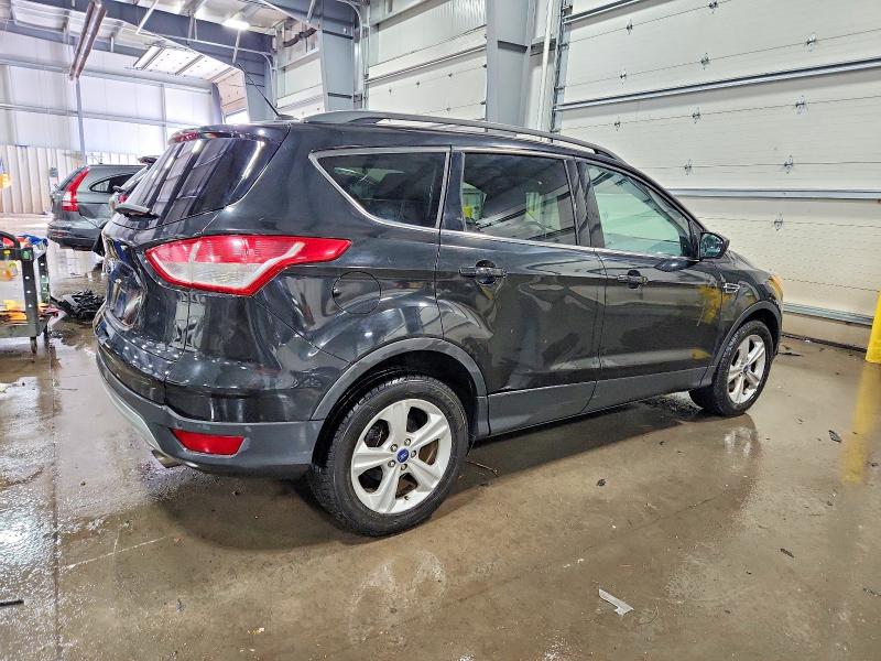 Photo 3 from auction – 2015 FORD ESCAPE SE with VIN 1FMCU9G95FUB67610