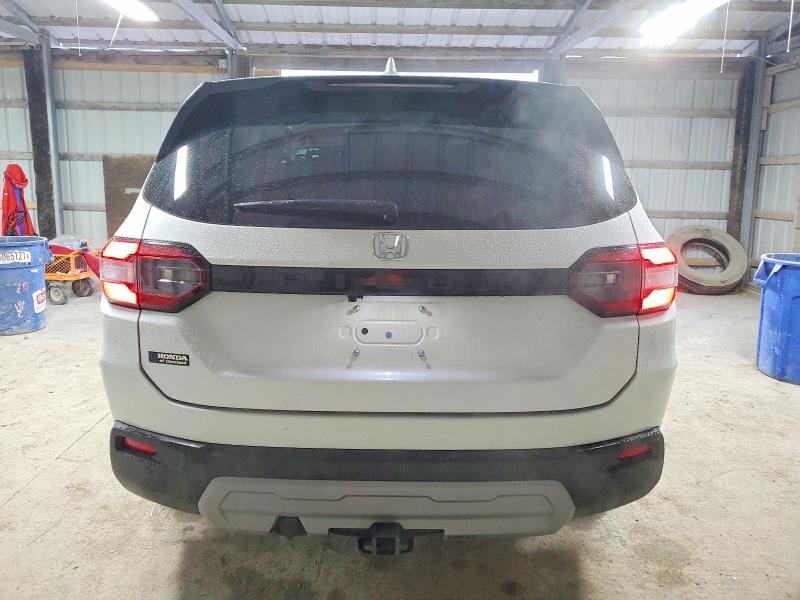 Photo 6 from auction – 2023 HONDA PILOT EXL with VIN 5FNYG2H55PB009900