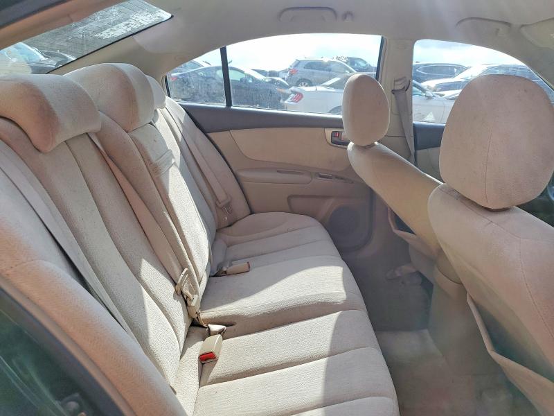 Photo 10 from auction – 2006 KIA OPTIMA LX with VIN KNAGE124165033507