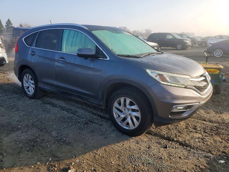 Photo 4 from auction – 2016 HONDA CR-V with VIN 2HKRM3H75GH544263