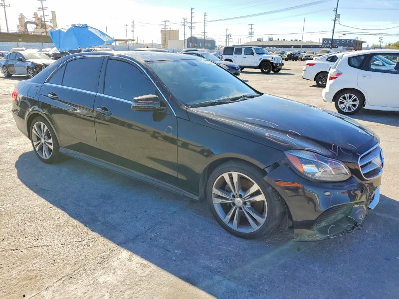 Photo 4 from auction – 2014 MERCEDES-BENZ E with VIN WDDHF5KB2EB046105