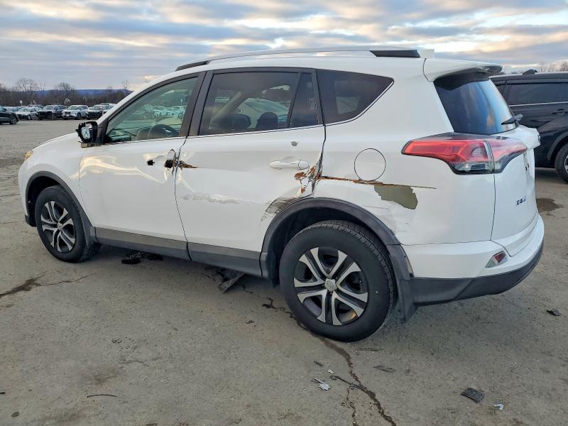 Photo 2 from auction – 2016 TOYOTA RAV4 LE with VIN 2T3BFREV0GW504232