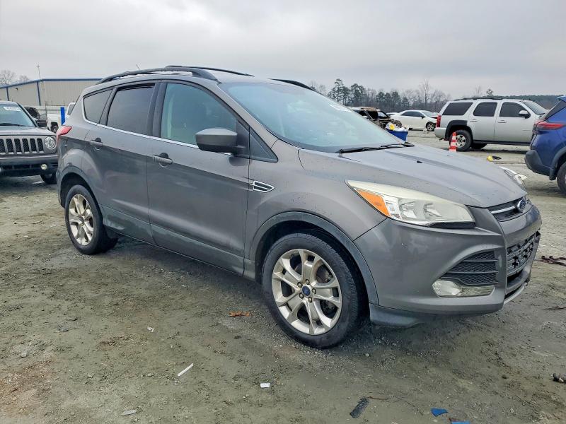Photo 4 from auction – 2013 FORD ESCAPE SE with VIN 1FMCU0G98DUD07352