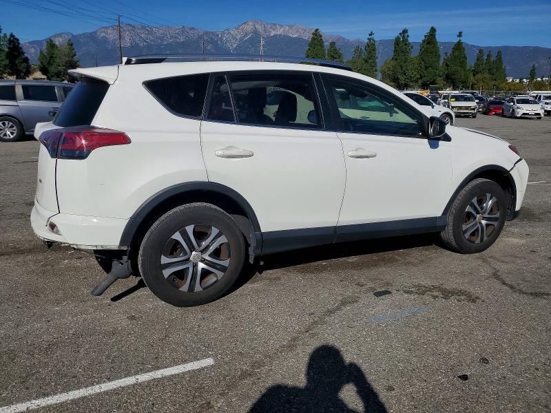 Photo 3 from auction – 2017 TOYOTA RAV4 LE with VIN JTMZFREV9HJ137829