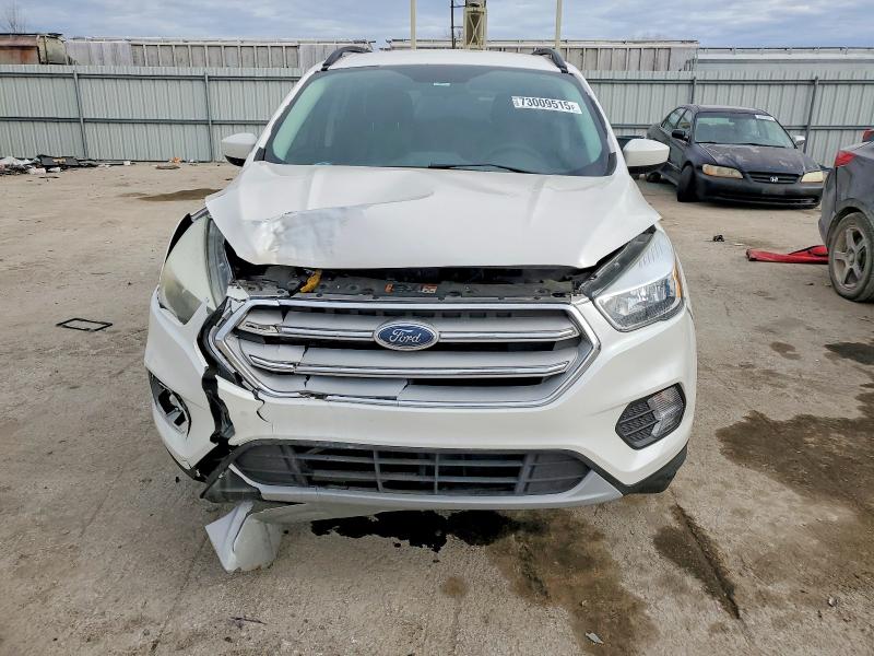 Photo 5 from auction – 2018 FORD ESCAPE with VIN 1FMCU0GD7JUA63791