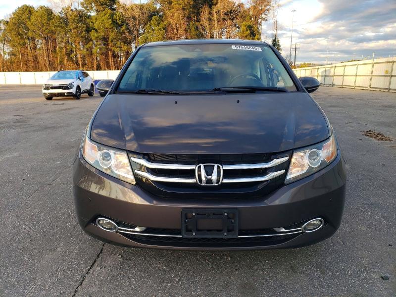 Photo 5 from auction – 2014 HONDA ODYSSEY TO with VIN 5FNRL5H92EB068050