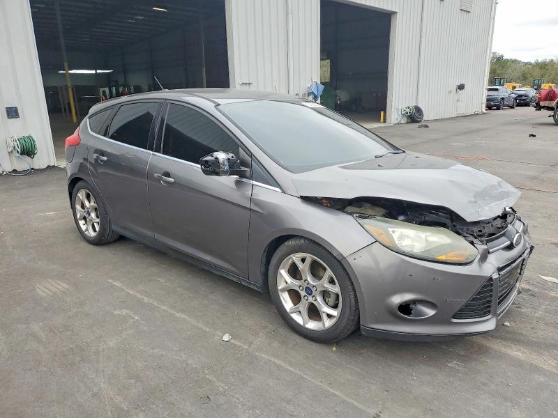 Photo 4 from auction – 2014 FORD FOCUS TITA with VIN 1FADP3N21EL261982