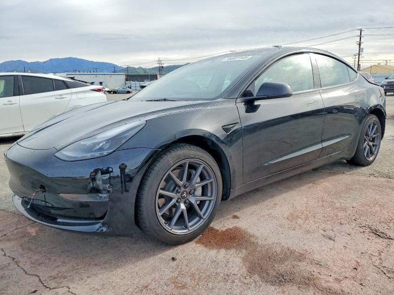 TESLA MODEL 3 2023 with VIN 5YJ3E1EA0PF709657 - Photo from auction
