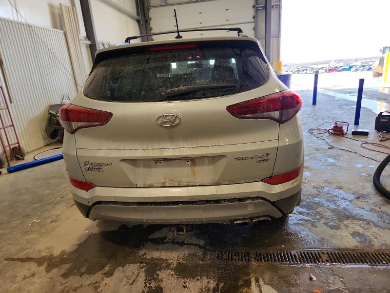 Photo 6 from auction – 2017 HYUNDAI TUCSON LIM with VIN KM8J3CA22HU382187