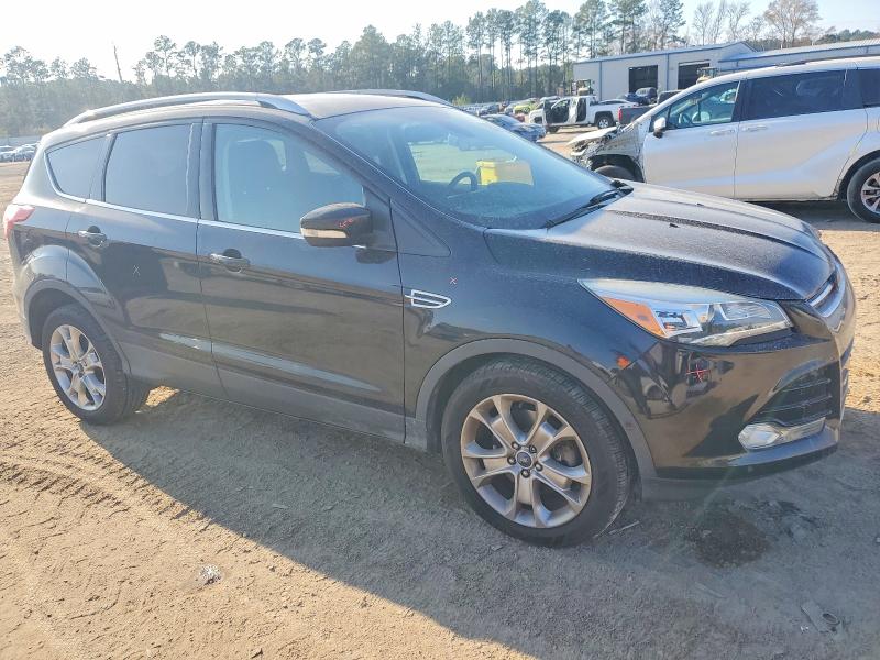 Photo 4 from auction – 2014 FORD ESCAPE with VIN 1FMCU9J92EUA27960
