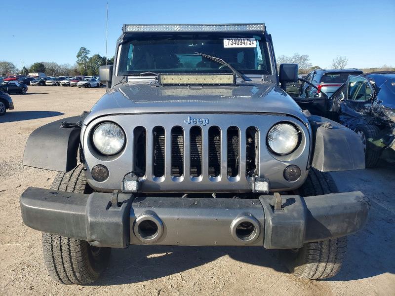 Photo 5 from auction – 2013 JEEP WRANGLER U with VIN 1C4BJWDG4DL628857