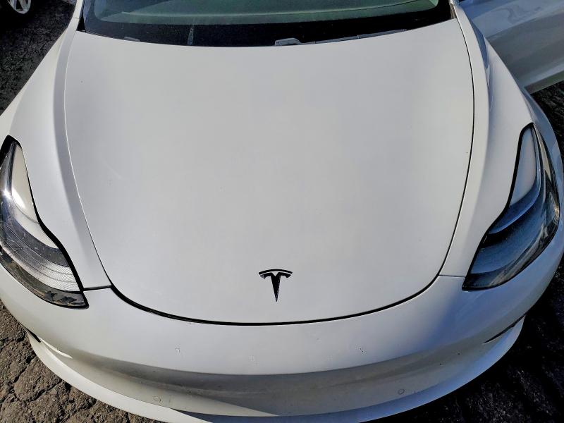 Photo 12 from auction – 2021 TESLA MODEL 3 with VIN 5YJ3E1EB0MF879103