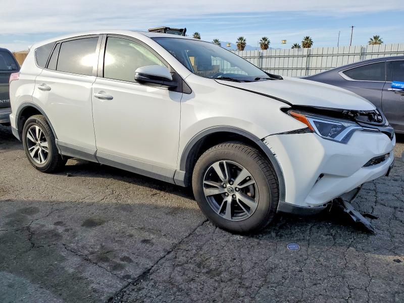 Photo 4 from auction – 2017 TOYOTA RAV4 XLE with VIN JTMWFREV0HD105157