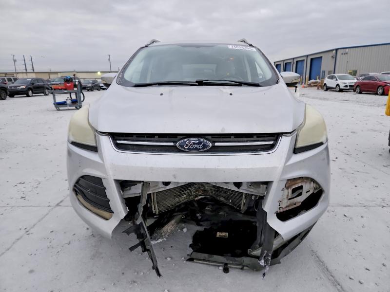 Photo 5 from auction – 2015 FORD ESCAPE with VIN 1FMCU0J92FUA46764
