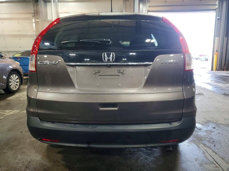 Photo 6 from auction – 2014 HONDA CR-V EXL with VIN 2HKRM4H79EH623020