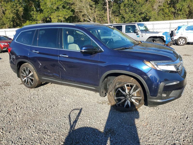 Photo 4 from auction – 2022 HONDA PILOT ELIT with VIN 5FNYF6H09NB029076