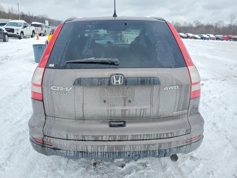 Photo 6 from auction – 2011 HONDA CR-V SE with VIN 5J6RE4H47BL022046
