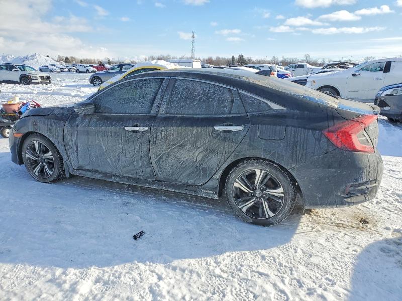 Photo 2 from auction – 2017 HONDA CIVIC with VIN 2HGFC1F96HH104157