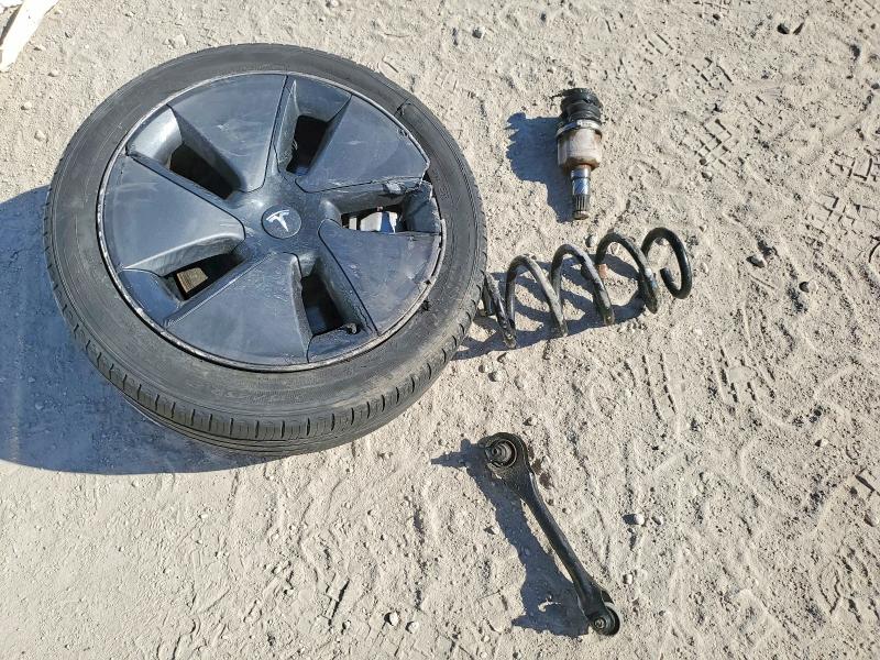 Photo 12 from auction – 2021 TESLA MODEL 3 with VIN 5YJ3E1EBXMF852779