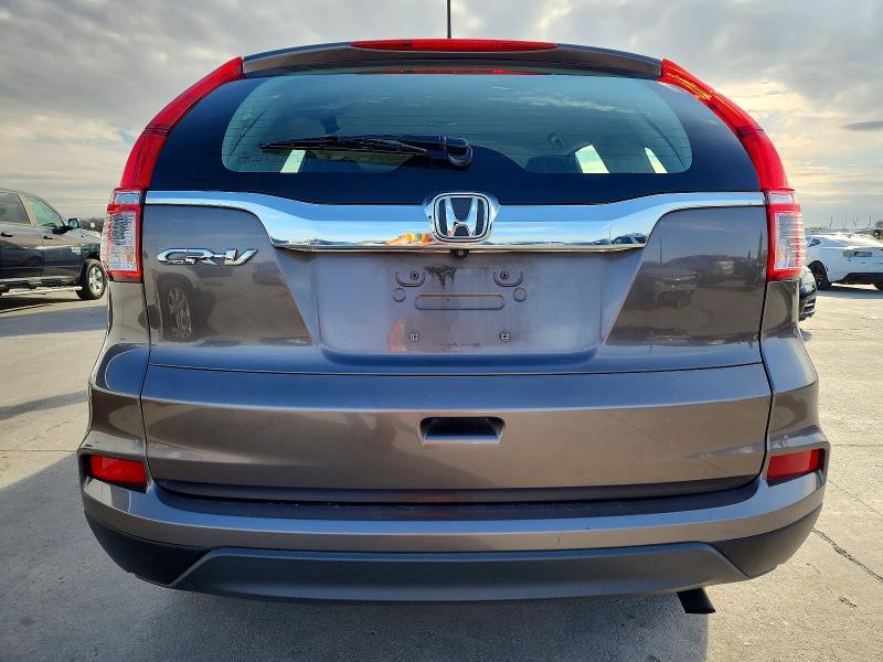 Photo 6 from auction – 2015 HONDA CR-V LX with VIN 3CZRM3H36FG702737