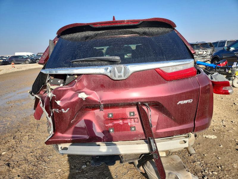 Photo 6 from auction – 2018 HONDA CR-V with VIN 2HKRW2H8XJH609502