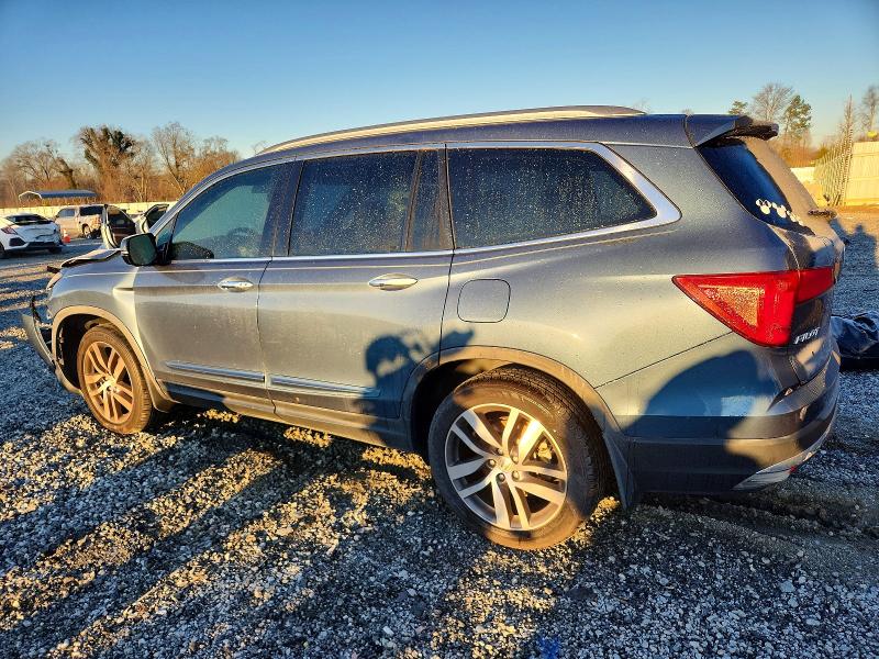Photo 2 from auction – 2017 HONDA PILOT TOUR with VIN 5FNYF5H98HB032189